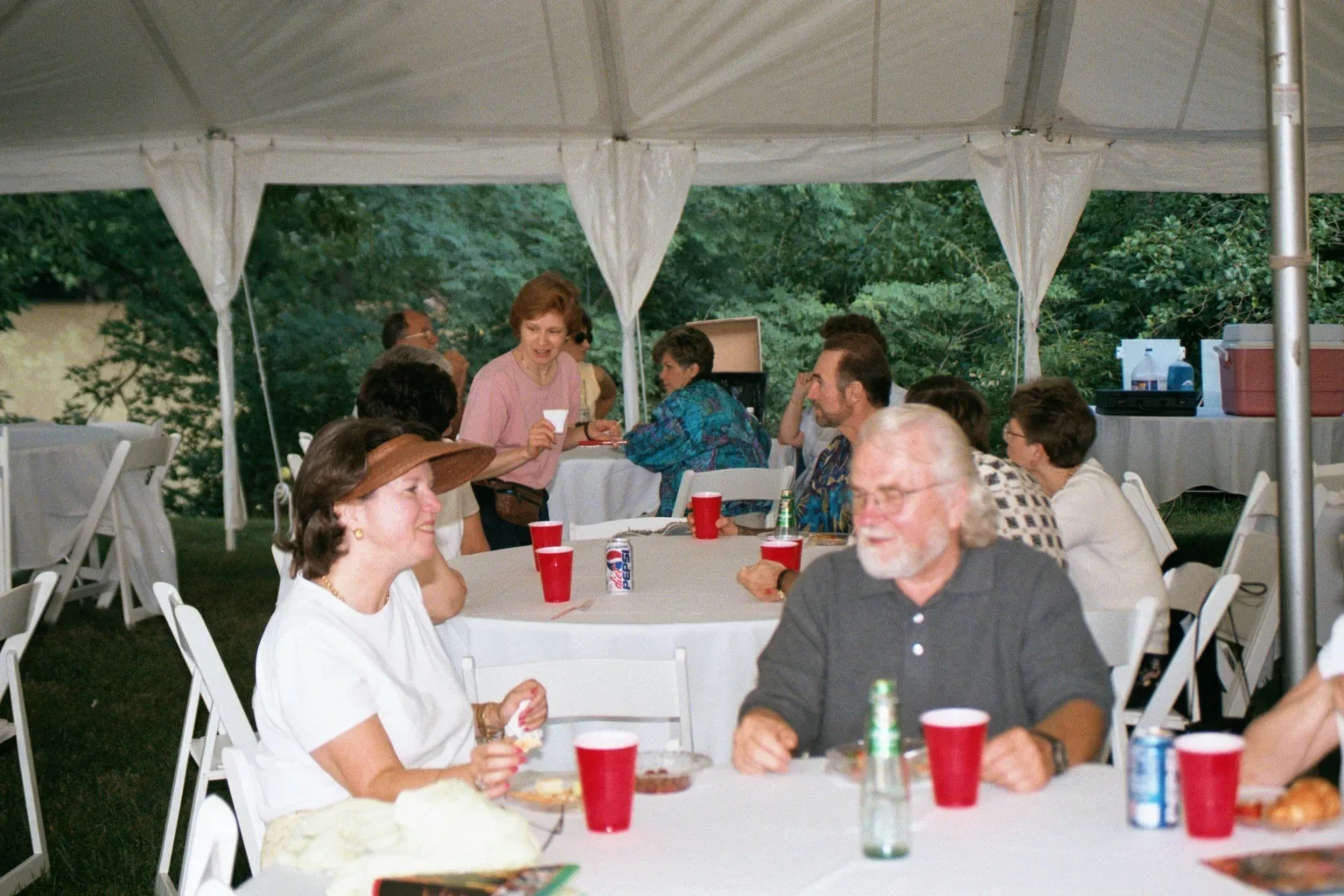 Guests sharing conversation at an arts gathering